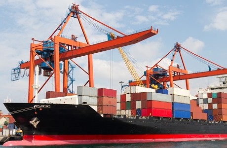 ship being loaded with marine cargo representing marine cargo insurance
